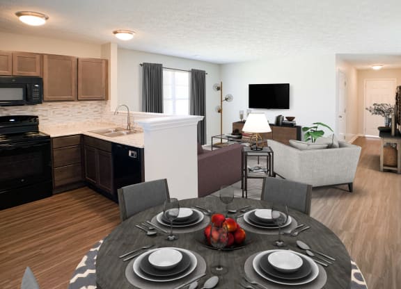 a dining room table in front of a kitchen and living room  at Aberdine Place, Georgetown, KY