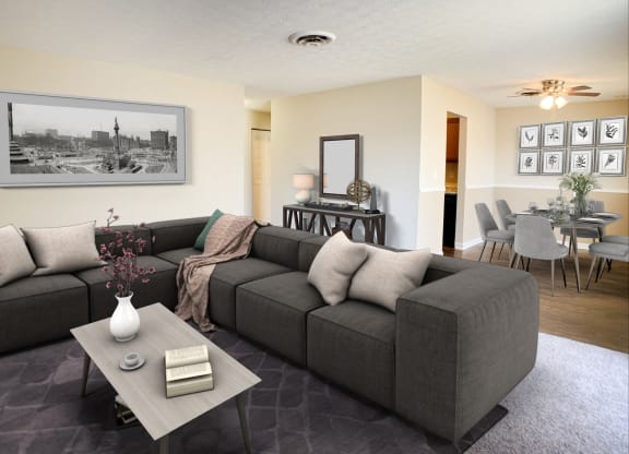 a living room with a couch and a coffee table  at Timber Ridge Apartments, Cincinnati