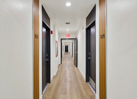A long hallway with doors 101 and 105.