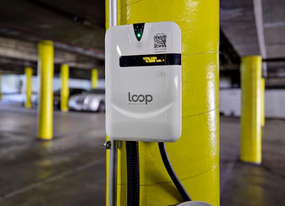 A white device labeled