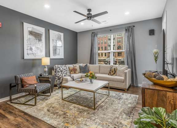 Unwind and Recharge in our Cozy Living Rooms. at Meeder Flats Apartment Homes, Cranberry Township, Pennsylvania