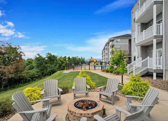 Patio with a firepit at Heights at Black Bear Apartments, Morgantown