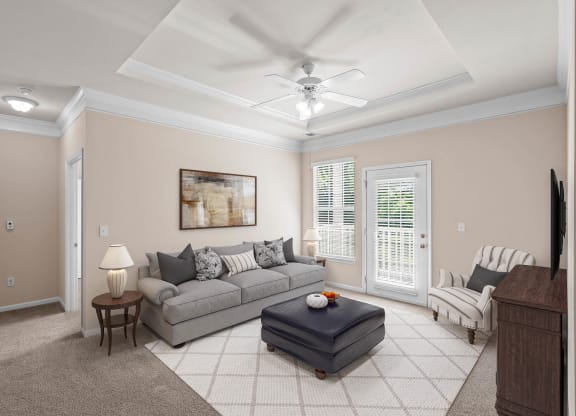 a living room filled with furniture and a ceiling fan at Creekside, Overland Park, Kansas
