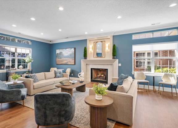 Community Room With Fireplace at The Claremont Apartment Homes, Kansas, 66210