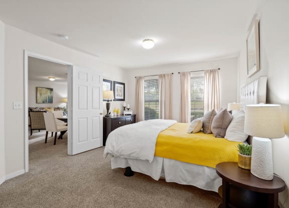 our apartments offer a bedroom with a king sized bedat Stonebriar Woods Apartments, Kansas, 66213