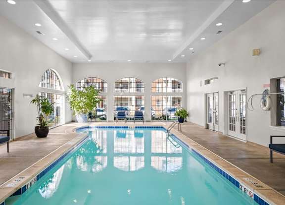 A large indoor swimming pool at The Claremont Apartment Homes, Overland Park, 66210