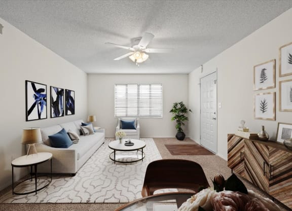 A living room with a window and a ceiling fan.