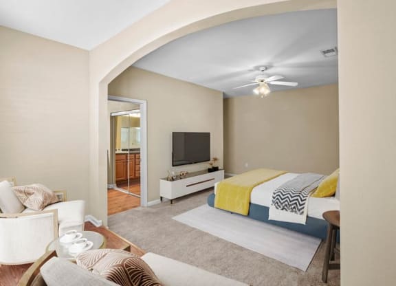 A large bedroom with a library niche at Avignon Apartments in Olathe, Kansas
