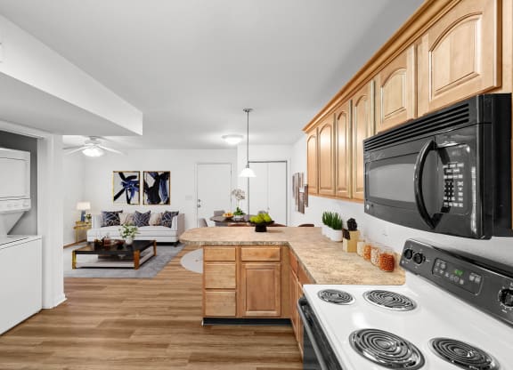 a kitchen and living room in a 555 waverly unit