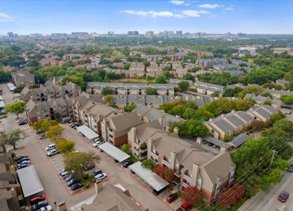 an aerial view of a neighborhood with houses and trees at Creekview Apartment Homes, Dallas, Texas