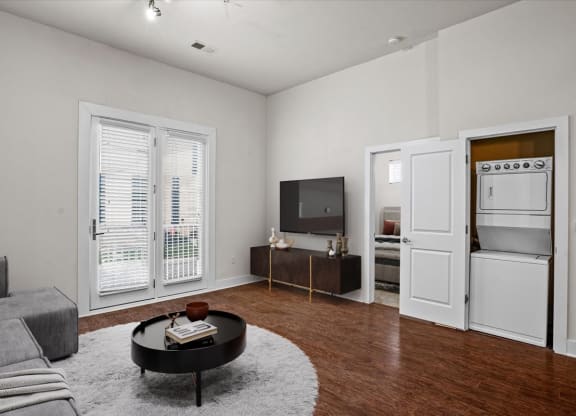 a living room with a couch and a tv