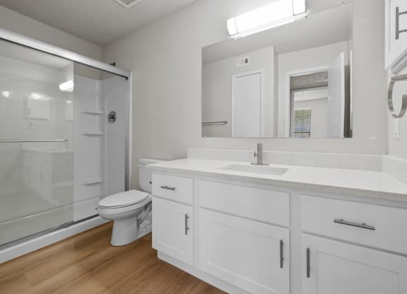 a bathroom with a sink toilet and a shower at Highland Park Apartment Homes, Kansas, 66214