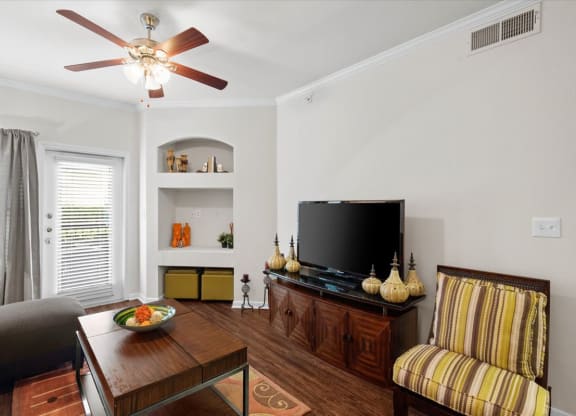 a living room with a tv and a couch
