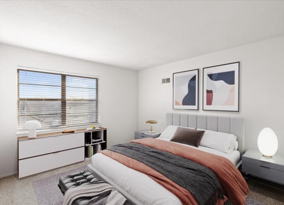 a bedroom with a bed and a window