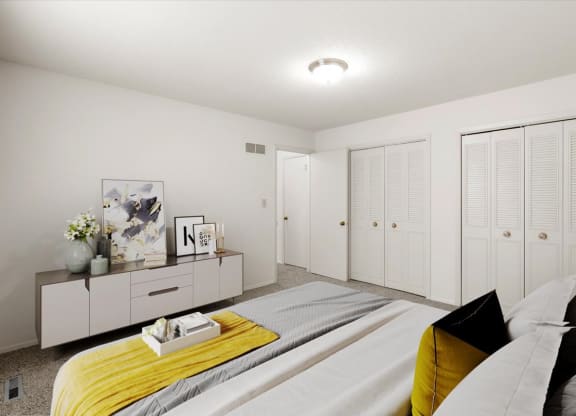 a bedroom with a bed and a closet