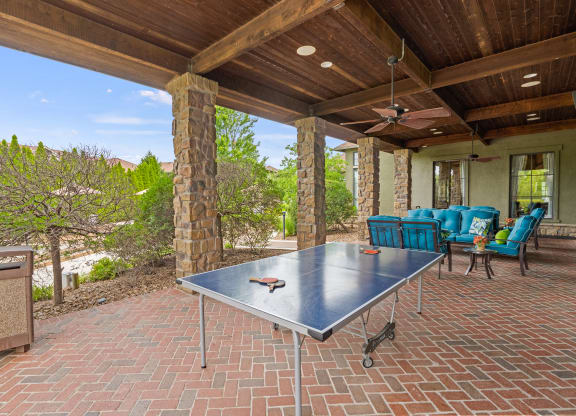 Avignon Apartments Outdoor Lounge with Ping Pong Table in Olathe, Kansas