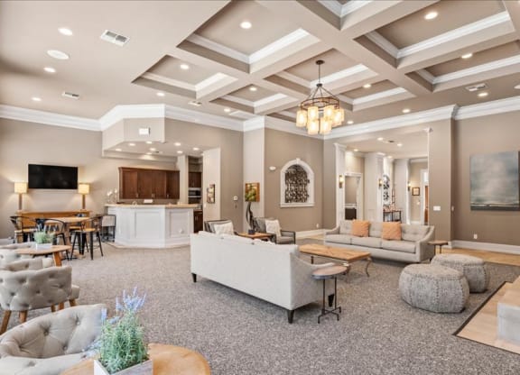 A large clubhouse with an event space and kitchen area.