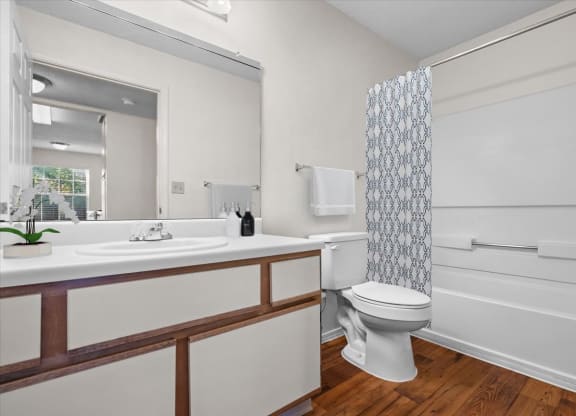 a bathroom with a toilet and a sink