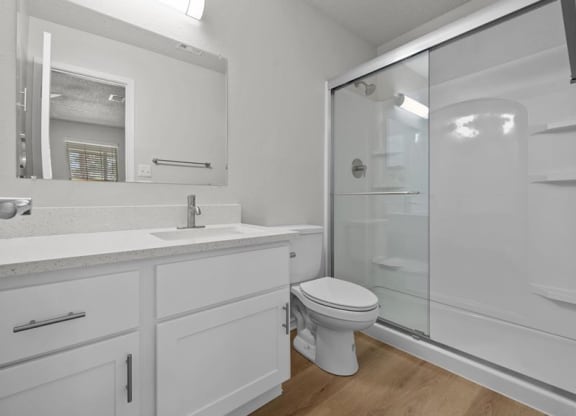 a bathroom with a sink toilet and a shower at Highland Park Apartment Homes, Kansas, 66214