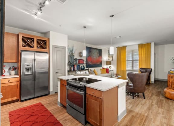 a kitchen and living room in a 555 waverly unit