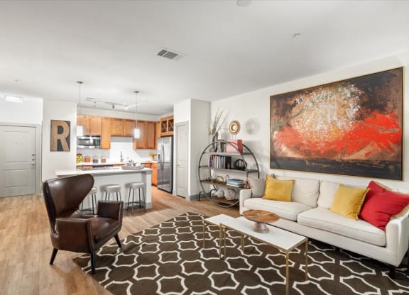 a living room with a couch and a chair