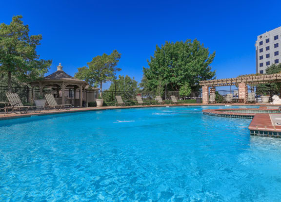 Swimming pool view at The Clairborne Apartment Homes, Texas