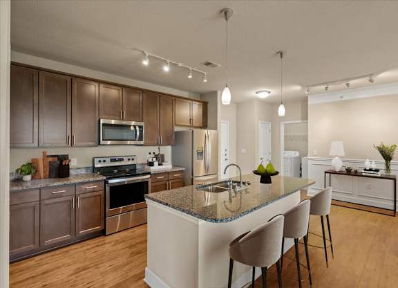Kitchen with Island at The Residences at Bluhawk Apartments, Overland Park, 66085