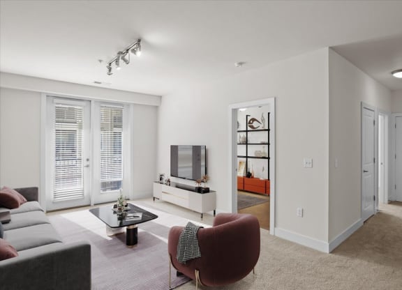 a living room with a couch and a tv