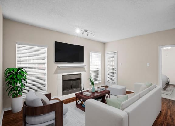 a living room with a fireplace and a tv at Creekview Apartment Homes, Dallas, 75254