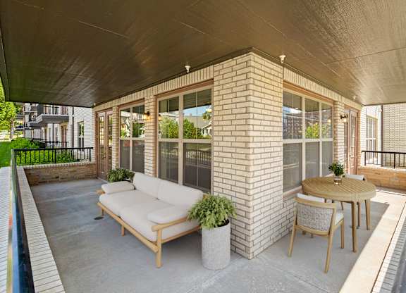 our apartments showcase a beautiful screened in porch at The Dorset, Kansas City, MO