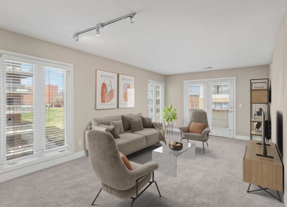 a living room with a couch and two chairs