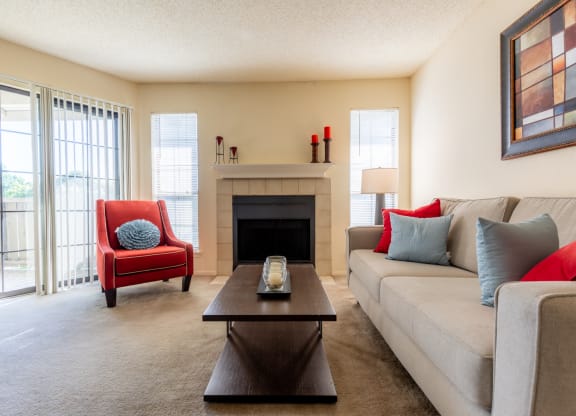 Couch in living room 1 at Coventry Oaks Apartments, Overland Park, 66214