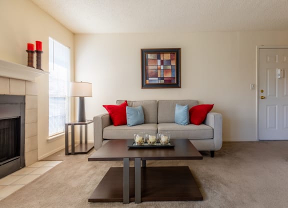 Couch in living room and center tableat Coventry Oaks Apartments, Overland Park, Kansas