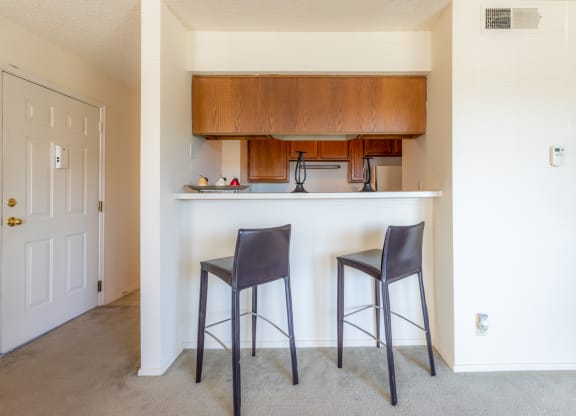 Kitchen with wooden cabinetat Coventry Oaks Apartments, Overland Park