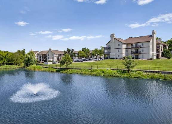 Lakefront apartment homes overlooking the community fountain and walking trail.