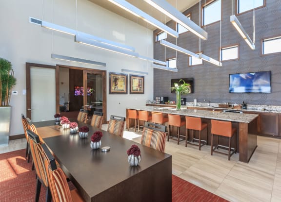 clubhouse kitchen and tables  at Prairie Creek Apartments & Townhomes, Lenexa, 66219