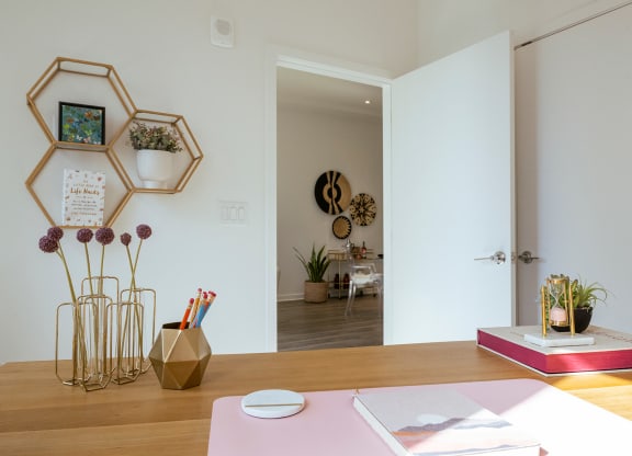 bedroom in b1 floorplan staged as an office at Sky on Main in Kansas City, MO