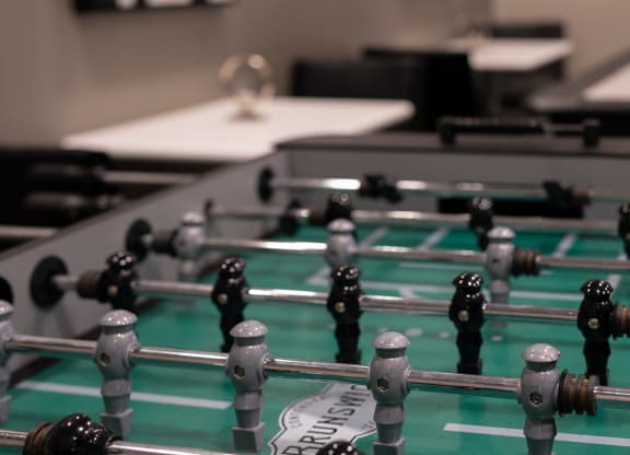 foosball table in game room at Sky on Main in Missouri, 64105