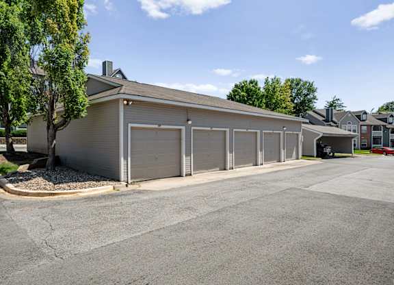 Row of detached garages at Stonebriar Apartments community in Overland Park KS