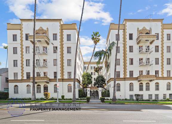 A building with the words Beach Front Property Management on the front.