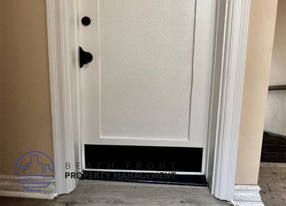 A white door with the number 1091 on it.