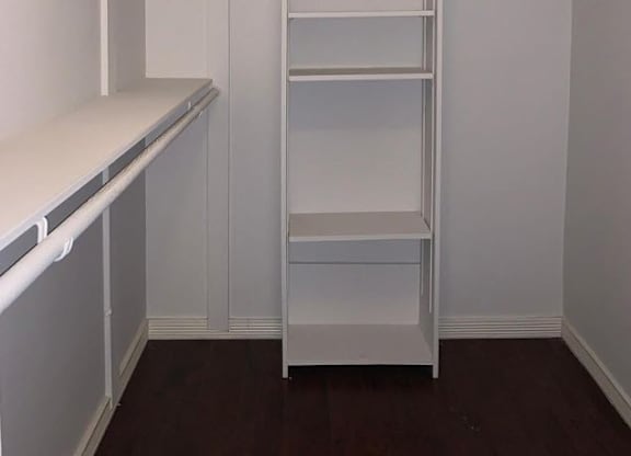 the living room and kitchen are open to the dining area and living room with a