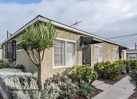A house with a garden in front.