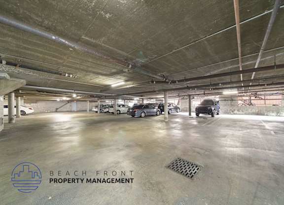 a parking garage with cars parked in it