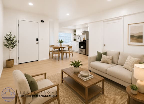 A living room with a couch, chair, and coffee table.