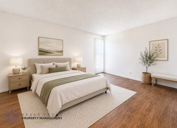 A well-lit bedroom with a large bed and a small tree.
