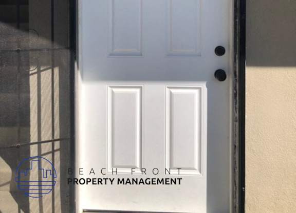 A white door with a number 5 on it.