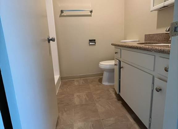 a small bathroom with a toilet and a sink