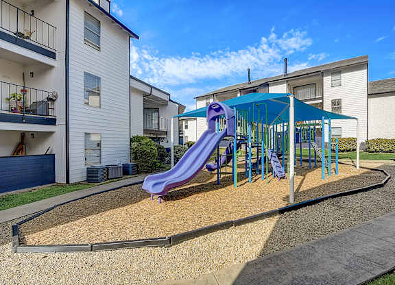 playground at the enclave at woodbridge apartments in sugar land, tx