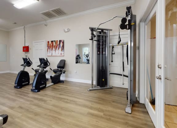 the gym at the flats at big tex apartments